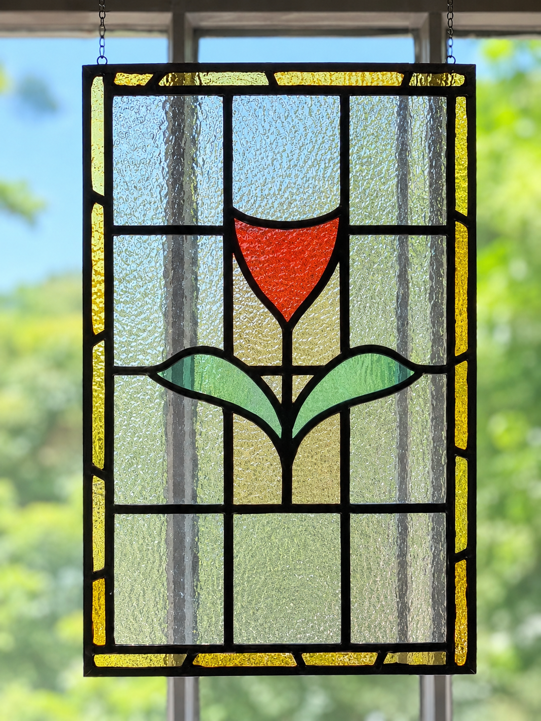 stained glass at a Estate Sale Company Tulsa in Brookside area.